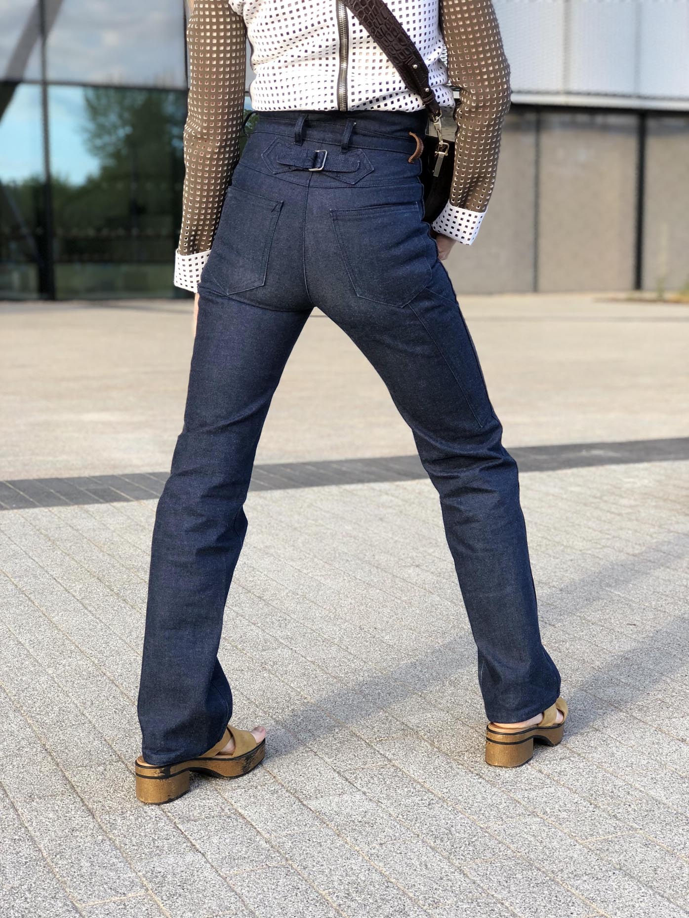 flared acne jeans, jw anderson top, saddle bag zofia chylak, vagabond shoes by Fashion Art Media